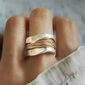 Silver Ring with Golden Thread Design